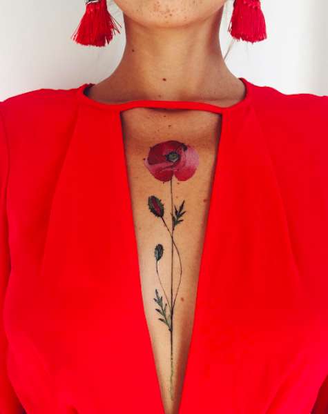 Tatuaggio delicato con fiore