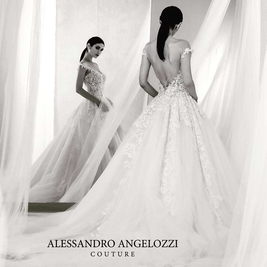 Abito da sposa in pizzo con gonna ampia