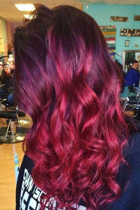 Shatush rosso magenta su capelli neri