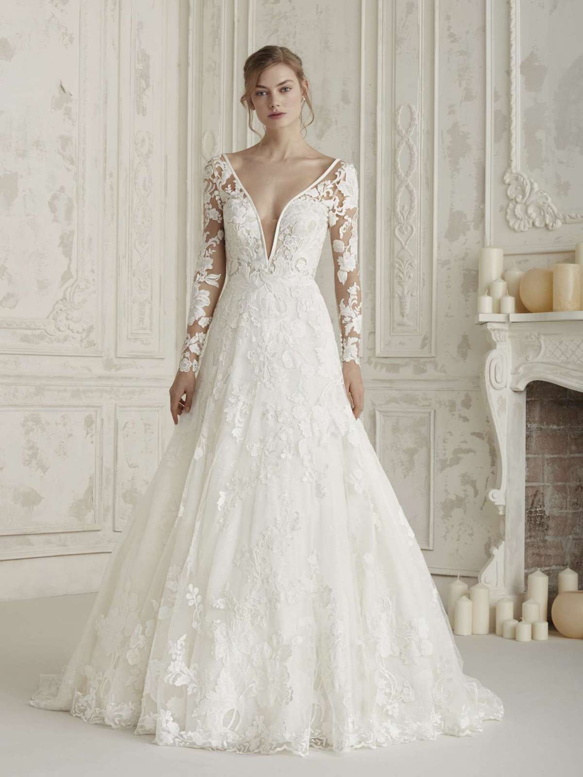 Abito da sposa a maniche lunghe