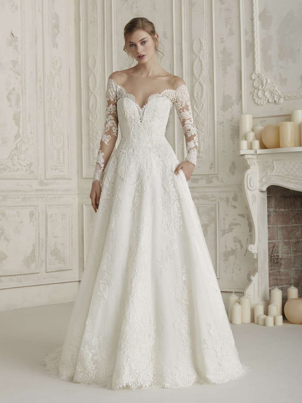 Vestito da sposa con maniche lunghe in pizzo