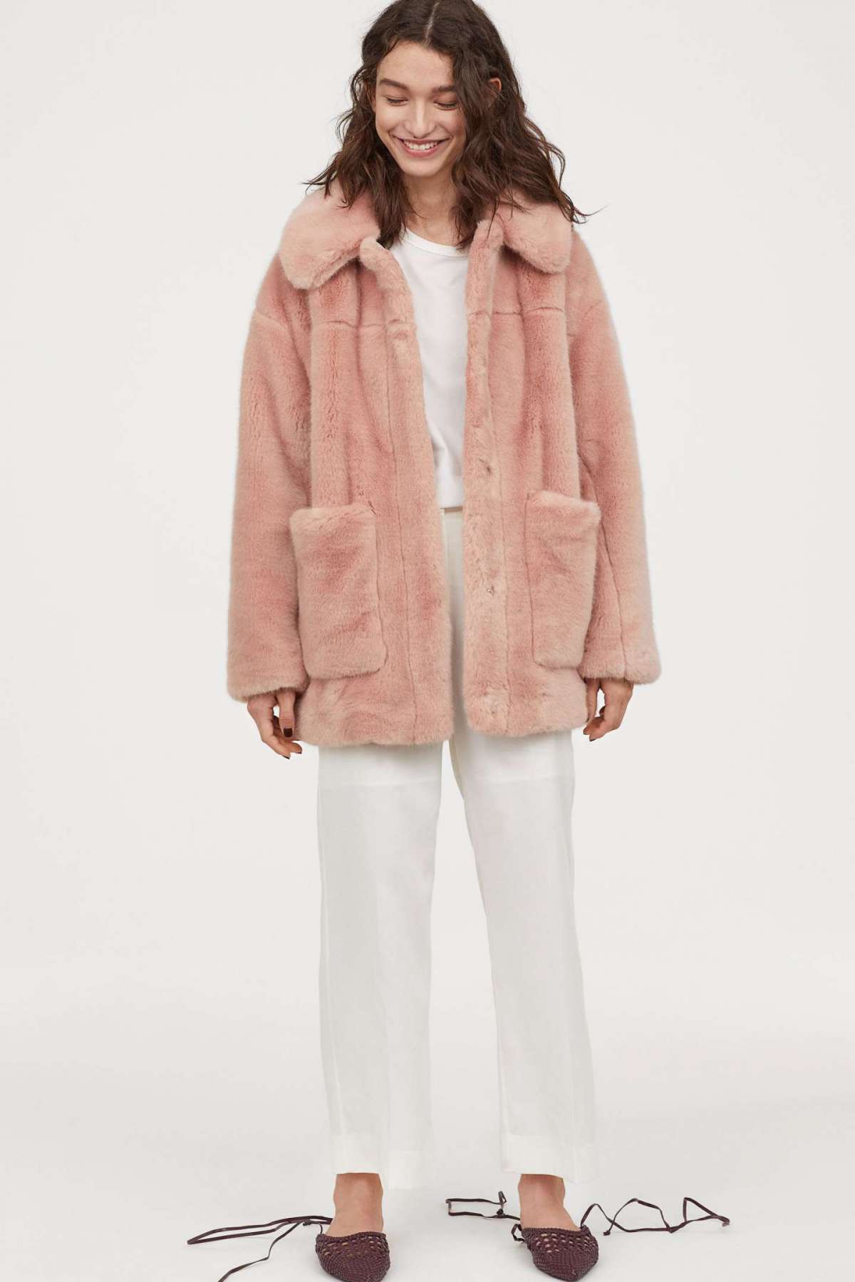 Cappotto in pelliccia sintentica rosa H&M a 79,99 euro